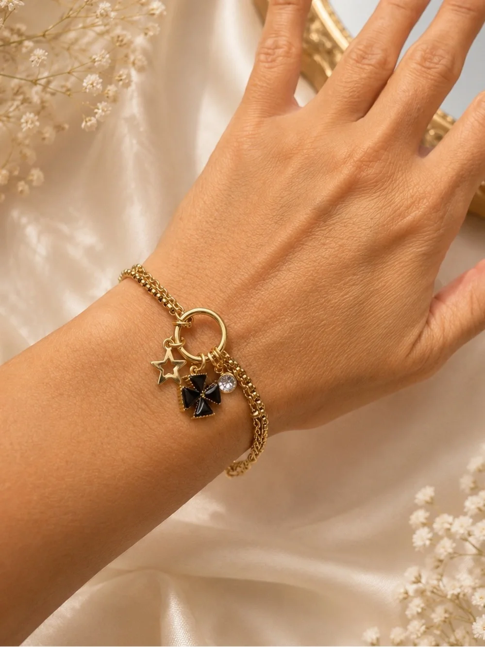 Gold Multi chain Bracelet with Black  Clover Charm